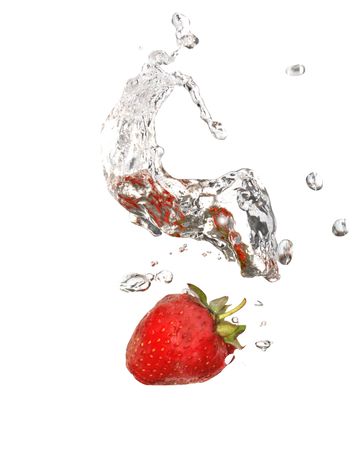 Splashing water background with red strawberryの写真素材