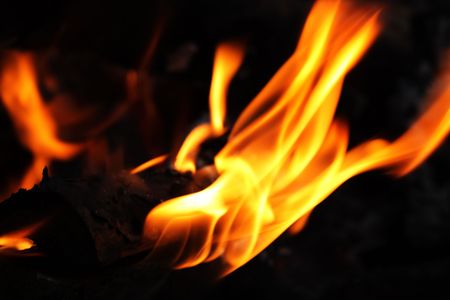 Background with single flame on darkの写真素材