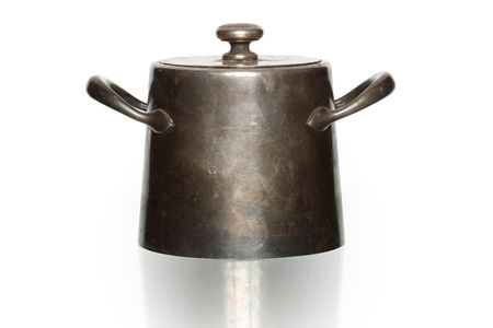 Ancient bronze saucepan isolated on white backgroundの写真素材