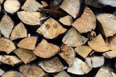 Background made from pile of chopped firewood. Extreme closeupの写真素材