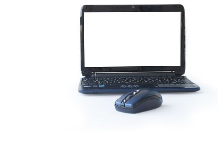 Computer mouse near modern laptop with blank isolated screen for your imagesの写真素材