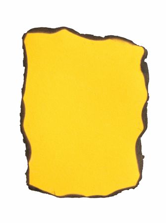 Yellow burned paper isolated on white background with clipping pathの写真素材
