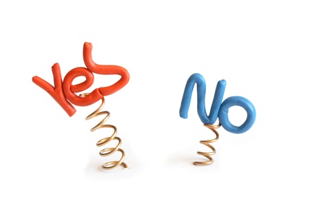 Words Yes and No made from plasticine attached to metal springs on white backgroundの写真素材