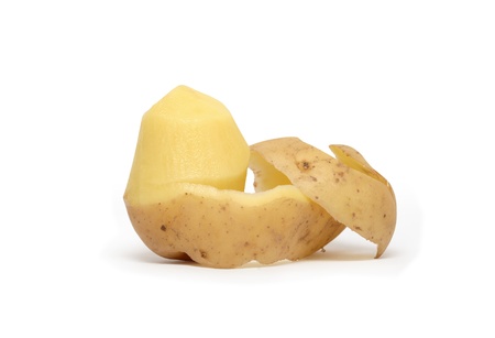 Raw peeled potato isolated on white backgroundの写真素材
