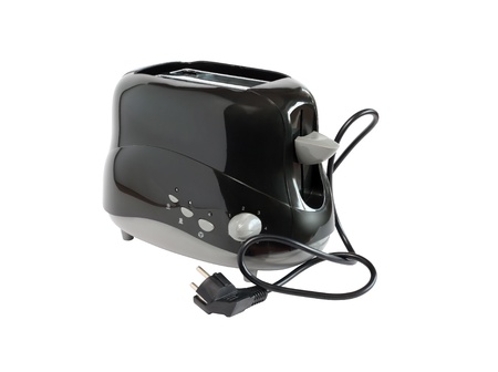Black toaster with unplugged cable on white background. の写真素材