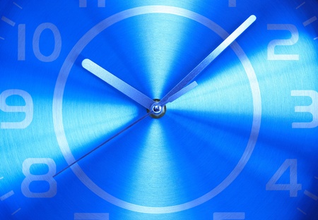 Extreme closeup of blue metal clock face. Nice backgroundの写真素材