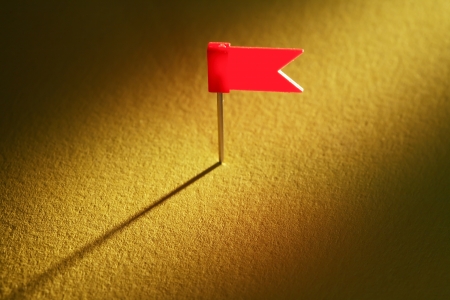 One drawing flag pin on nice yellow gradient backgroundの写真素材