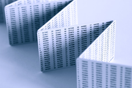Business abstract  Few plastic cards with digits on white background