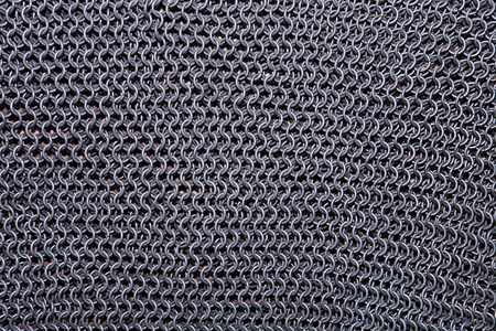 Closeup of old metal chain armour as background
