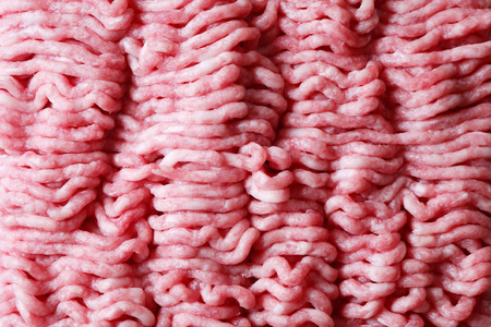 Cooking concept. Minced meat closeup background