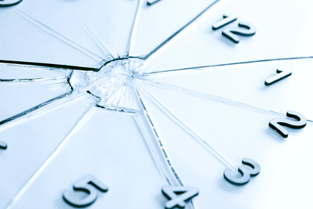 Digits as clock face on shattered glass background