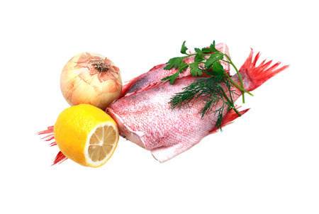 Two raw groupers ready for cooking on white background