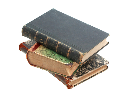 Stack of few very old books on white backgroundの写真素材