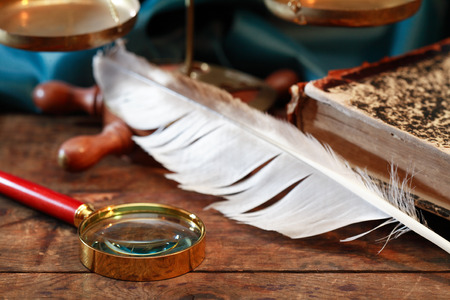 Vintage still life with old magnifying glass and other thingsの写真素材