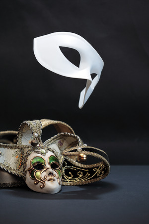 Theater concept. White classical carnival mask. Performance. Flight. Freedomの写真素材