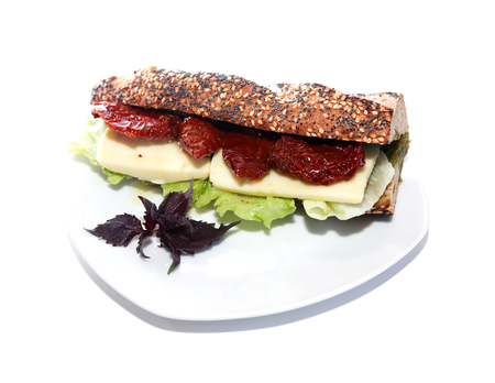 Freshness delicious sandwich on plate against white backgroundの写真素材