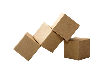 Set of brown cardboard cubes isolated on white backgroundの写真素材