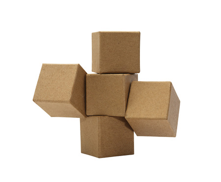 Set of brown cardboard cubes isolated on white backgroundの写真素材