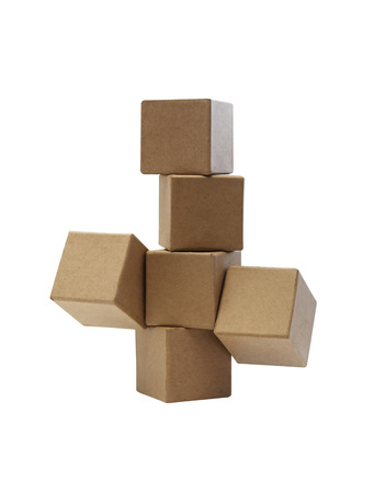 Set of brown cardboard cubes isolated on white backgroundの写真素材
