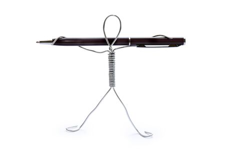 Man made from aluminum wire holding ballpoint penの写真素材