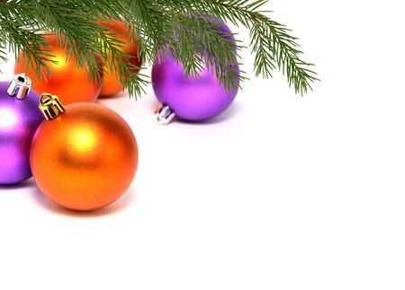 Christmas decoration. Fir twig with Christmas balls on white backgroundの写真素材