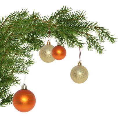 Christmas decoration. Fir twigs as border with Christmas balls on white backgroundの写真素材