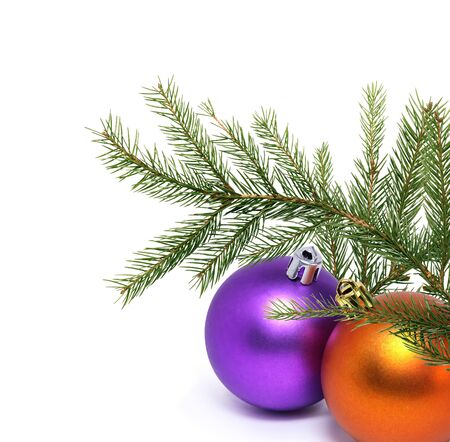 Christmas decoration. Fir twigs as border with Christmas balls on white backgroundの写真素材