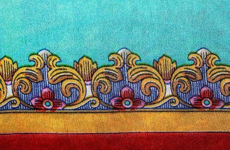 Bright cloth background. Closeup of traditional Asian fabricの写真素材