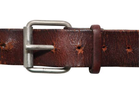Very old leather belt isolated on whiteの写真素材