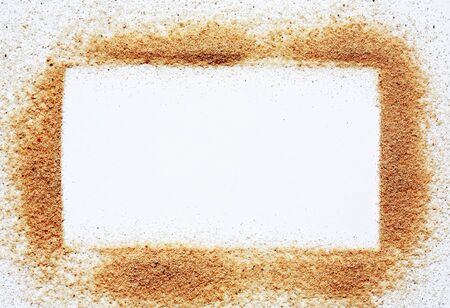 Summer concept. Picture frame with blank space made from sandの写真素材