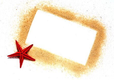Summer concept. Picture frame with blank space made from sandの写真素材