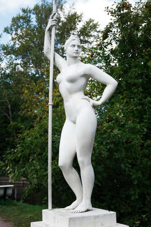 Classical Soviet art. Girl with a paddle statue in gardenのeditorial素材