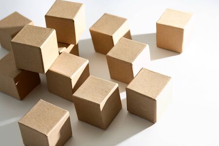 Set of cardboard cubes on white background with shadowの写真素材