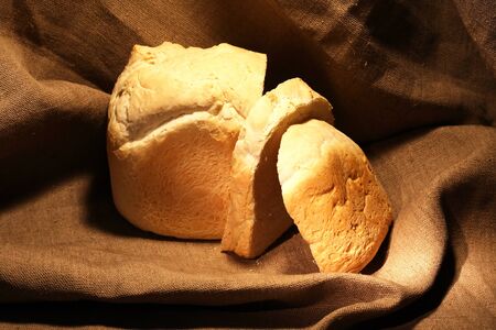 Sliced loaf of white bread on canvas backgroundの写真素材