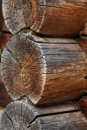 Extreme closeup background with old house corner made from logsの写真素材