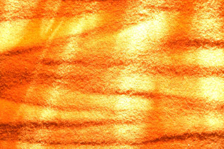 Nice art background. Abstract sand surface with lines of lightの写真素材
