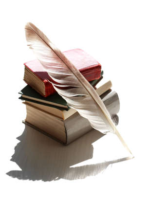 literature concept. Still life with stack of book and quill penの写真素材