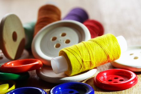 Diversity sewing set on old wooden backgroundの写真素材