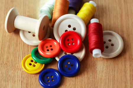 Diversity sewing set on old wooden backgroundの写真素材