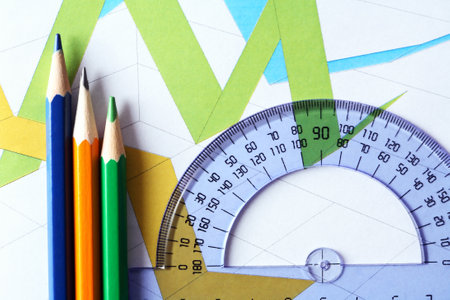 Business concept. Colored pencils and ruler on the background of the diagramの写真素材