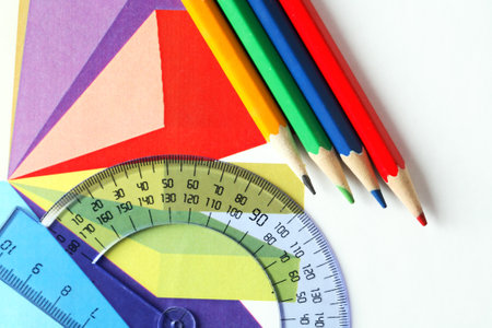 Business concept. Colored pencils and ruler on the background of the diagramの写真素材