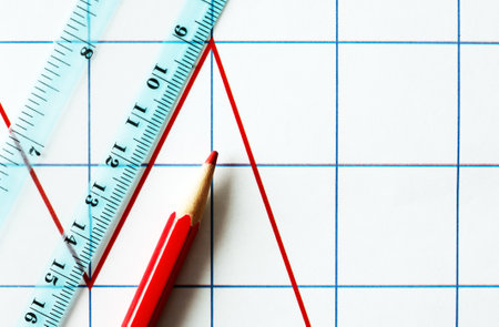 Business concept. Red pencil on the background of the diagramの写真素材