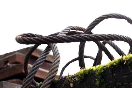 Industrial background. Extreme closeup of old metal hawserの写真素材