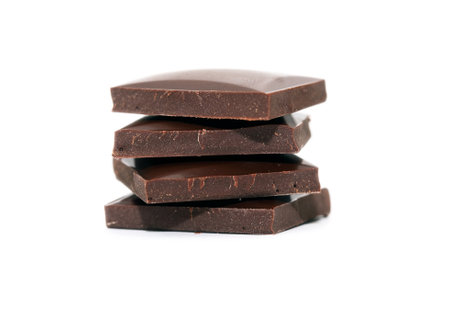 Stack of chocolate bars isolated on white backgroundの写真素材
