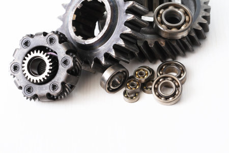 Part of the mechanism. Few old gears on white backgroundの写真素材