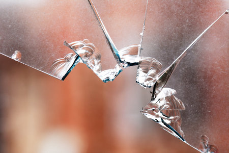 Closeup of shattered windowの写真素材