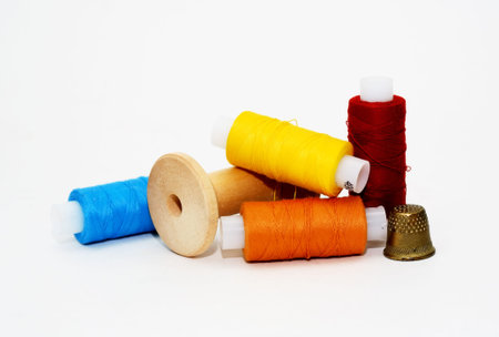 Sewing kit: thread, needle, bobbin, pins, and other accessories