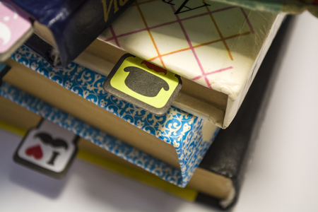 Old books on a white background. Cheerful and amusing bookmarks with moustaches of different...