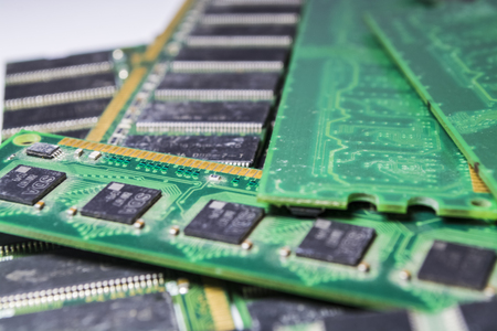 Old and dusty memory cards from the personal computer. Diskettes. Motherboard. Repair of the computer. Green color.の写真素材