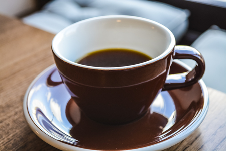 Alternative way of preparation of coffee. The invigorating morning strong drink in the server and a cup.の写真素材